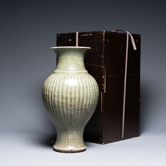 A ribbed Chinese Longquan celadon vase, Ming