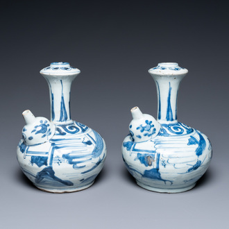 A pair of Chinese blue and white kendi depicting a figure in a landscape, Wanli