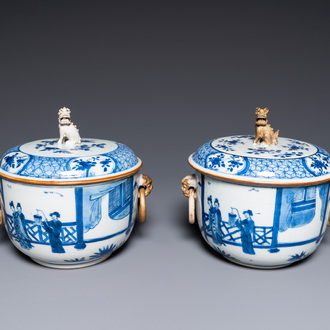 A pair of Chinese blue and white covered bowls, 19th C.