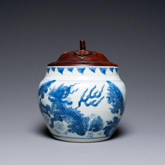 A Chinese blue and white 'qilin' bowl with later wooden cover, Transitional period