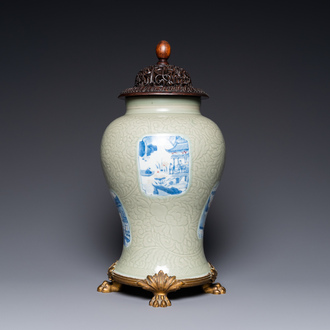 A Chinese celadon-glazed 'lotus scroll' vase with blue, white and copper-red panels, Kangxi