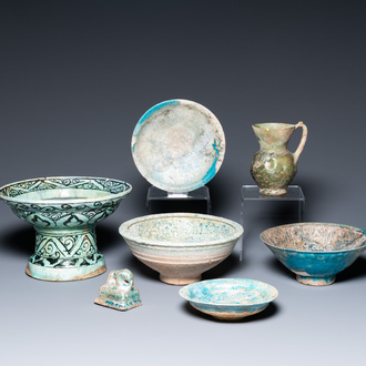 Two turquoise- and black-glazed dishes, three bowls, a jug and a small lion, Raqqa and Nishapur, Middle-East, 12/13th C. and later