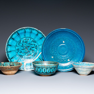 A collection of three turquoise-glazed bowls and two dishes, Middle-East, a.o. Kubachi, 13th C. and later