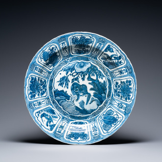 A very large Chinese blue and white kraak porcelain dish with a mythical beast, Wanli