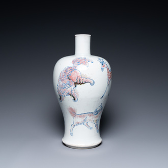 A Chinese blue, white and copper-red 'meiping' vase with mythical animals, Qianlong mark, 18/19th C.