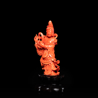 A Chinese carved red coral 'Tara' figure, 19/20th C.