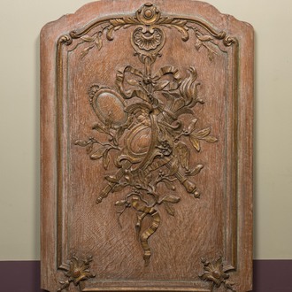 A French carved wooden 'Style Transition' panel with ribbons and acanthus leaves, 18th C.