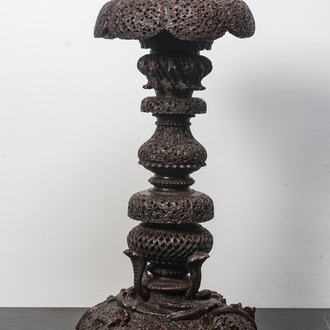 An Anglo-Indian colonial carved wooden plant stand with cobras and floral design, ca. 1900