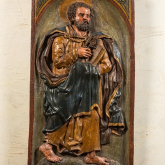 A large Spanish polychrome wooden alto relievo depicting Saint Peter, 17th C.