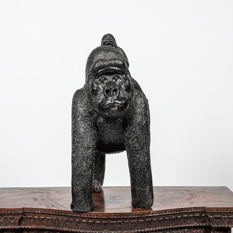 A black painted polystone gorilla with young, 20th C.