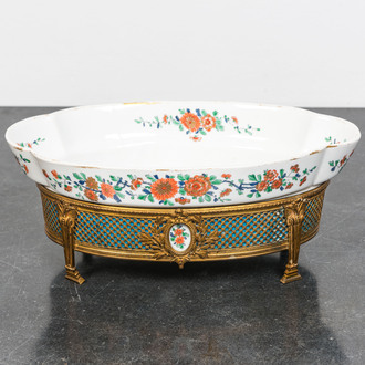 A French gilt bronze-mounted famille verte-style porcelain centerpiece with Chantilly mark, Samson, 19th C.