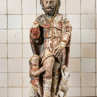 A large polychrome limestone 'Saint Roch with boy and dog' group, 17/18th C.