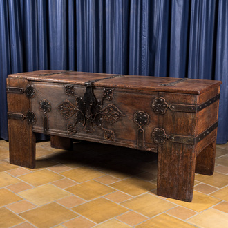 A large German rectangular wooden 'Stollentruhe' chest with iron and brass mounts, Westphalia, 17th C.
