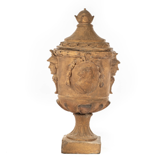 A large terracotta urn and cover with Roman busts and soldier heads, France or Italy, 18/19th C.