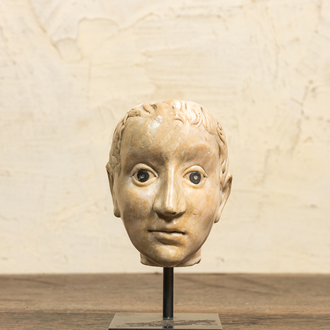 An Italian marble head in Roman-style with coins inlaid as eyes, probably 17th C.