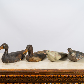 Two polychrome wooden decoy ducks and two pigeons, 19/20th C.