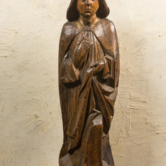A large walnut figure of John the Baptist from a calvary, late 15th C.