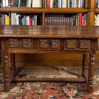 A Spanish walnut table with three drawers, 17th C.