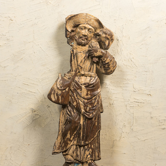 A large oak wooden figure of Jesus the Good Shepherd with traces of polychromy, late 16th C.