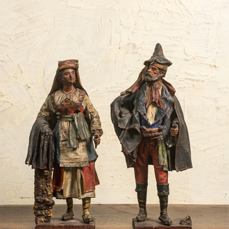 A pair of Neapolitan polychrome terracotta figures of a man and a woman, Italy, 18/19th C.