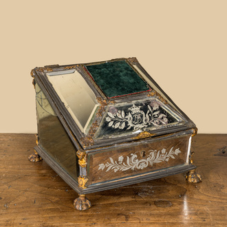 A German engraved and enamelled mirror glass and partly gilt metal box, inscribed and dated 1749