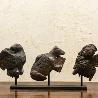 Three carved oak fragments of an eagle, a lamb and a lion referring to the evangelists, 16th C.
