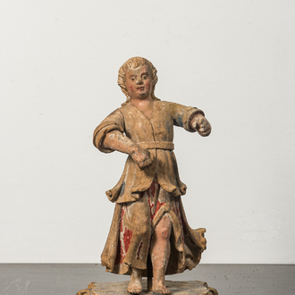 A carved wooden figure of an angel with traces of polychromy, 17/18th C.