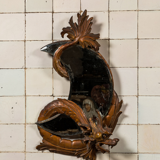 A moon-shaped mirror in a basswooden 'dragon' frame in the style of Viardot, 19/20th C.