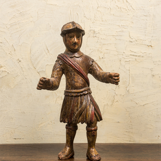 A polychrome wooden figure of a soldier, 17th C.