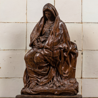 A Flemish oak sculpture of the Lamentation of the Virgin, late 16th C.