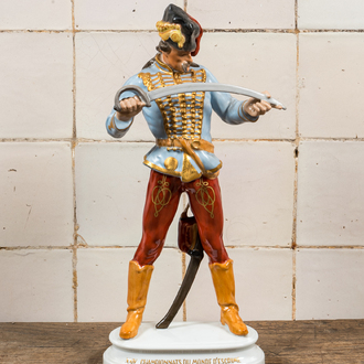 A Hungarian Herend porcelain figure of a hussar on the occasion of the 24th World Fencing Championship, Budapest, 1959