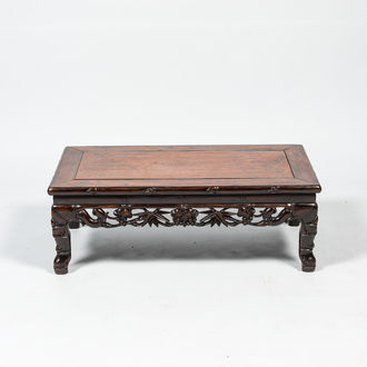 A Chinese hardwood opium table, 20th C.