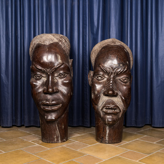 Two African wooden man's heads, 20th C.