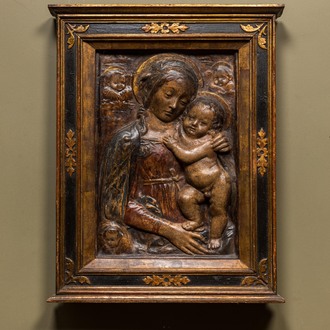An Italian polychrome stucco relief with Madonna with Child, possibly Florence, 16/17th C.