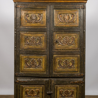A painted wooden four-door cupboard, Southern Europe, 19th C.