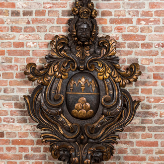 A large partly gilt wooden armorial carving, Italy, 19th C.