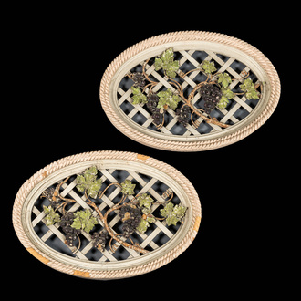 Two openworked polychrome wooden 'grapevines' medallions, 19/20th C.