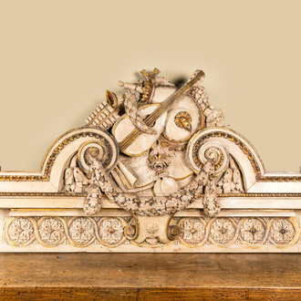 A neoclassical patinated and gilt wooden crown of a music room, ca. 1800