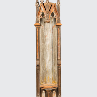 A patinated wooden Gothic Revival base with canopy, 19th C.