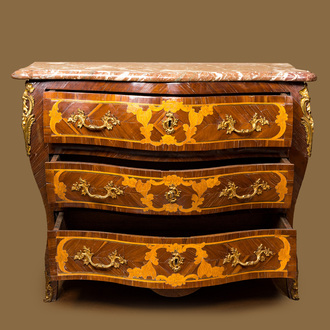 A French mahogany veneered commode à tombeau with floral marquetry, marble top and gilt bronze mounts, 18th C.