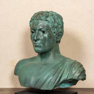 A large green patinated bronze bust of a Roman, 20th C.