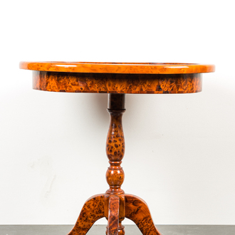 An oval side table with rootwood veneer and parquetry, 20th C