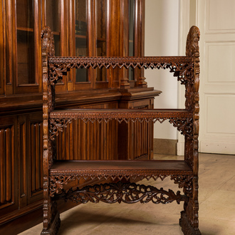 A richly carved oak etagère with floral design, probably Italy, 19th C.