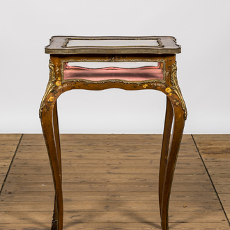 A Louis XV-style bronze mounted walnut table display case with polychrome floral design, 19th C.