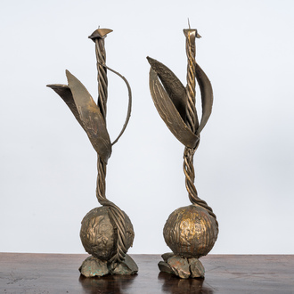 A pair of large patinated bronze plant-shaped candlesticks, 20th C.