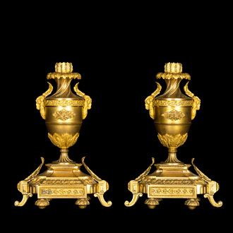 A pair of French gilt bronze Empire-style candlesticks, 19th C.