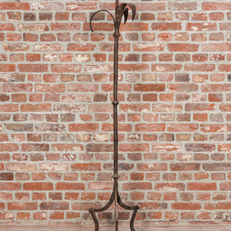 A large wrought iron candlestick, 19th C.