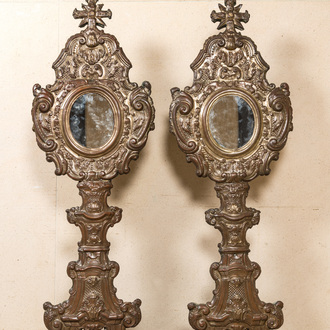 A pair of large gilt copper reliquaries mounted with mirror glass, probably Italy, 18/19th C.