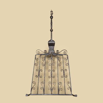 A Flemish wrought iron stove grate, 17th C.