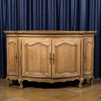 A French oak wooden four-door sideboard, 18/19th C.